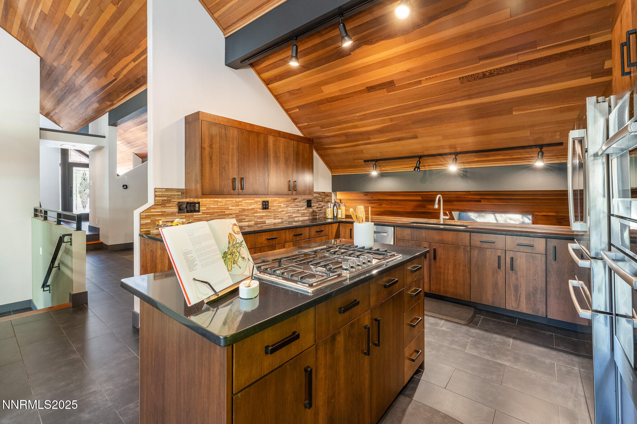2521 Lake Ridge Shores Circle Reno, NV 89519 - Photo 16 of 54 a kitchen with stove and cabinets