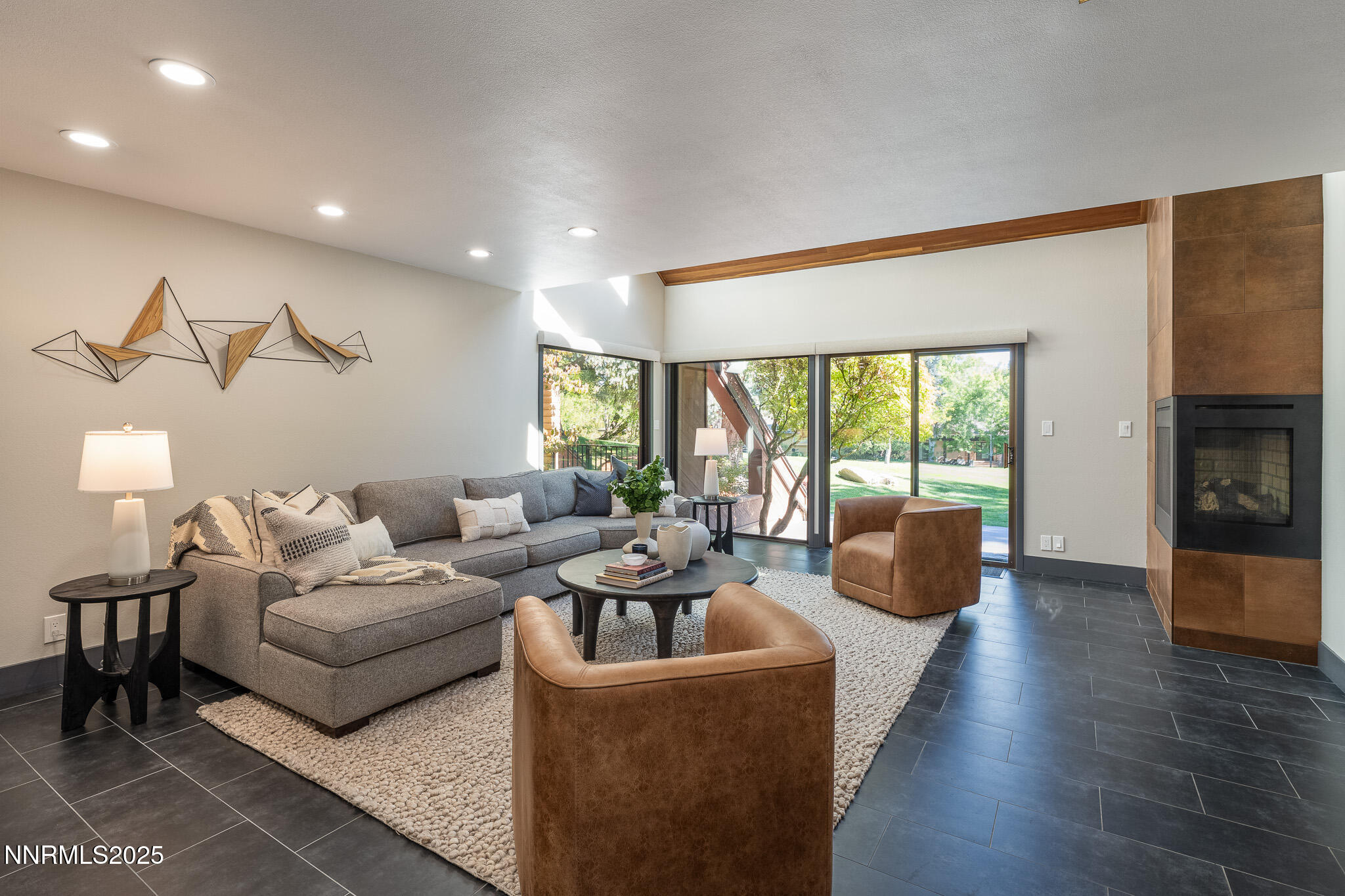2521 Lake Ridge Shores Circle Reno, NV 89519 - Photo 20 of 54 a living room with furniture and a large window