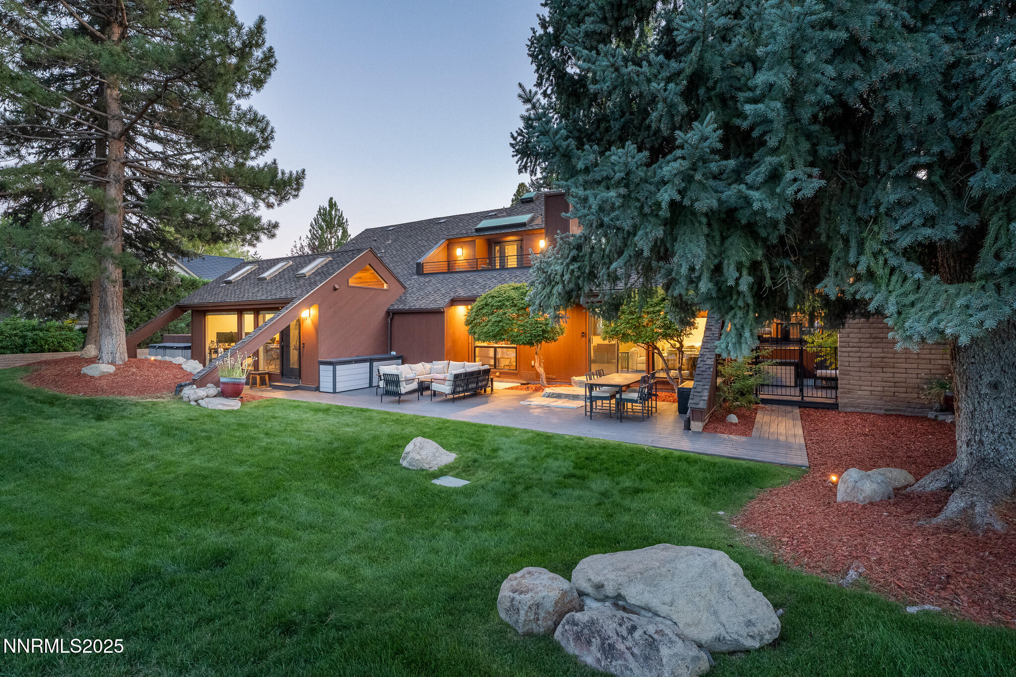 2521 Lake Ridge Shores Circle Reno, NV 89519 - Photo 2 of 54 a view of a backyard with swimming pool