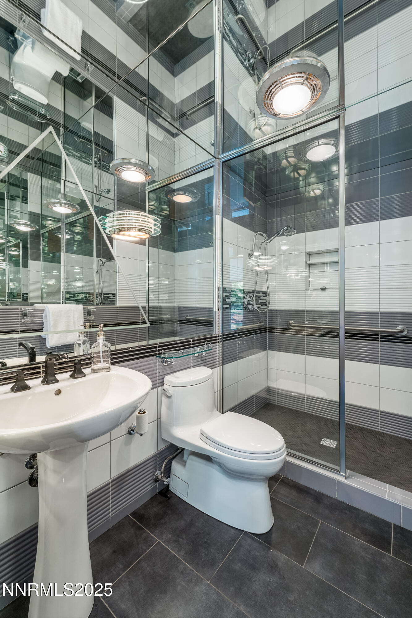 2521 Lake Ridge Shores Circle Reno, NV 89519 - Photo 22 of 54 a bathroom with a sink toilet and shower