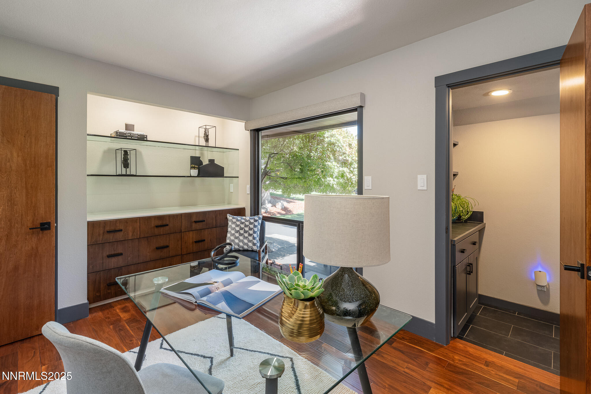 2521 Lake Ridge Shores Circle Reno, NV 89519 - Photo 25 of 54 a living room with furniture and wooden floor