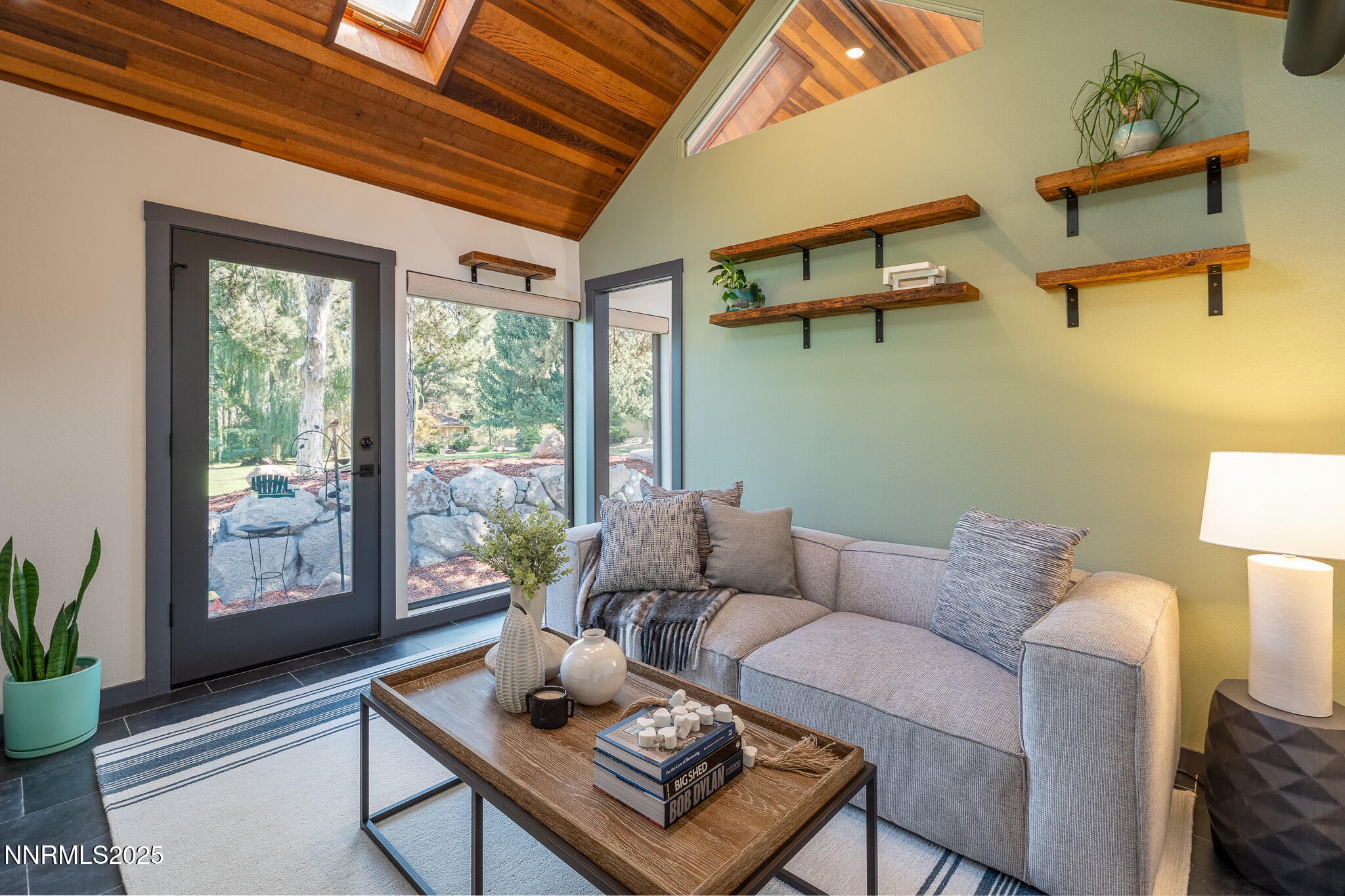 2521 Lake Ridge Shores Circle Reno, NV 89519 - Photo 26 of 54 a living room with furniture and a window