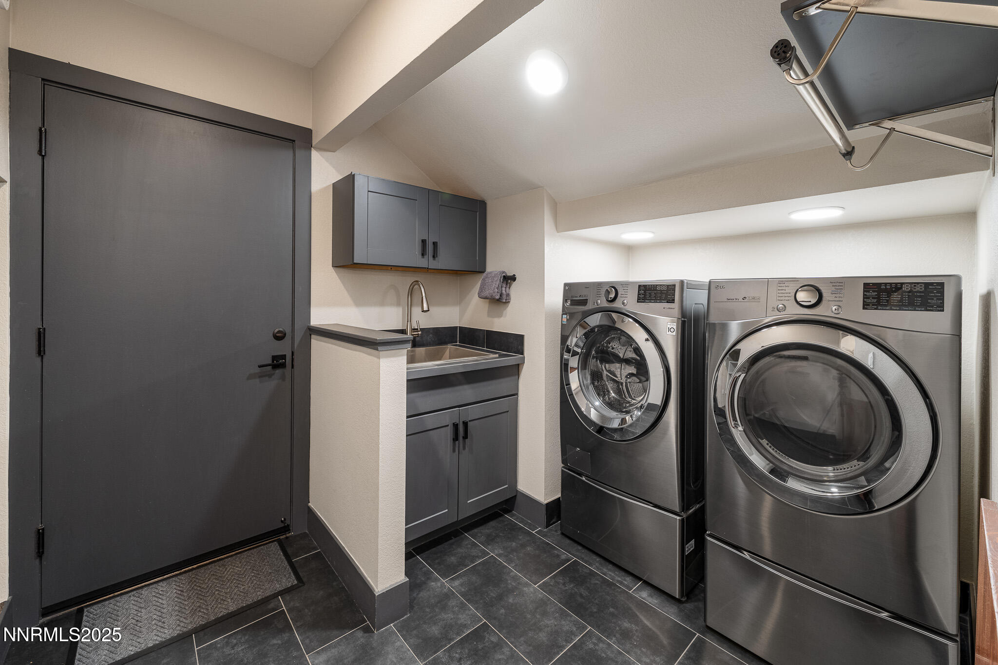 2521 Lake Ridge Shores Circle Reno, NV 89519 - Photo 29 of 54 a utility room with dryer and washer