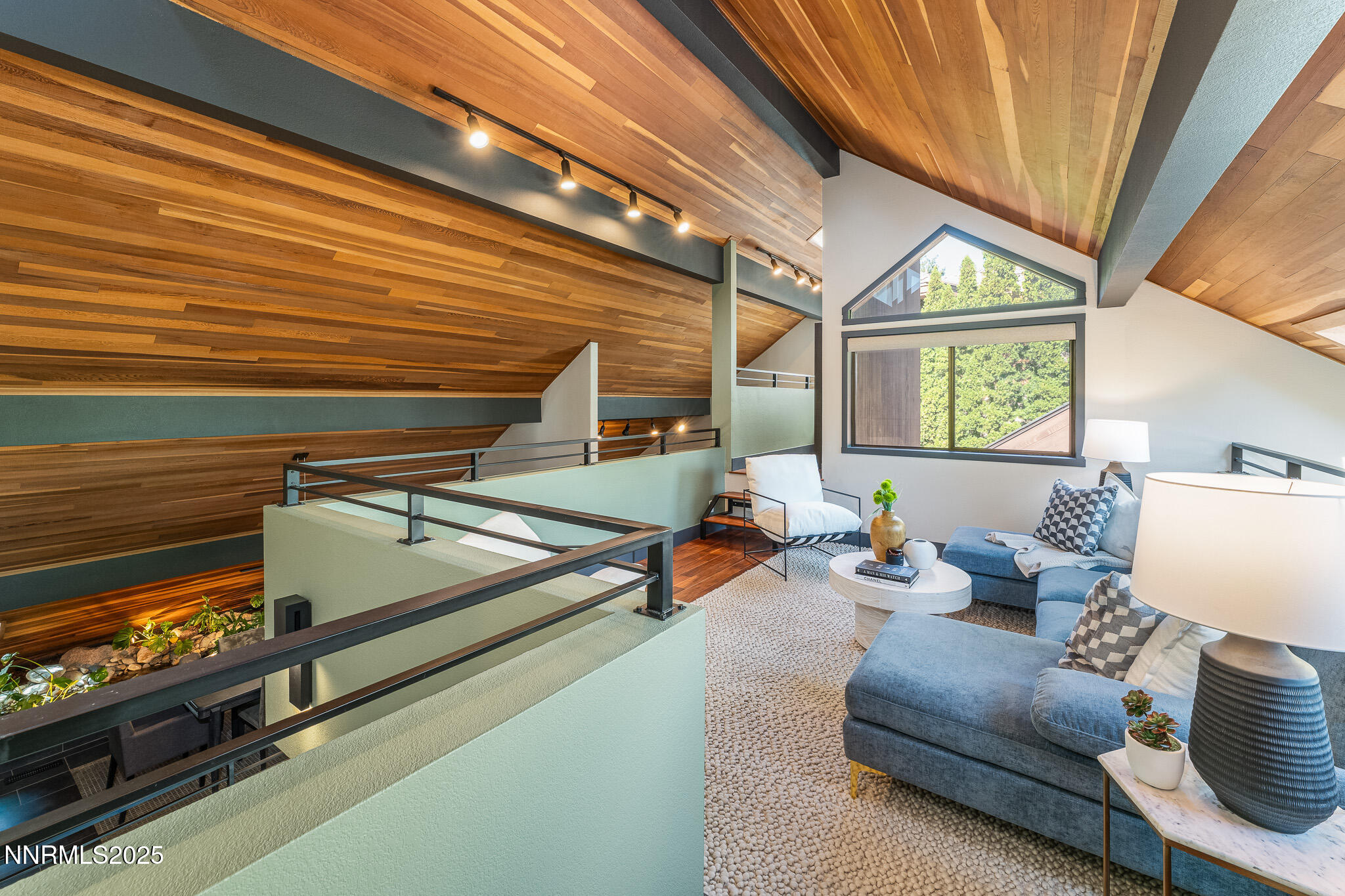 2521 Lake Ridge Shores Circle Reno, NV 89519 - Photo 31 of 54 a living room with furniture and a flat screen tv