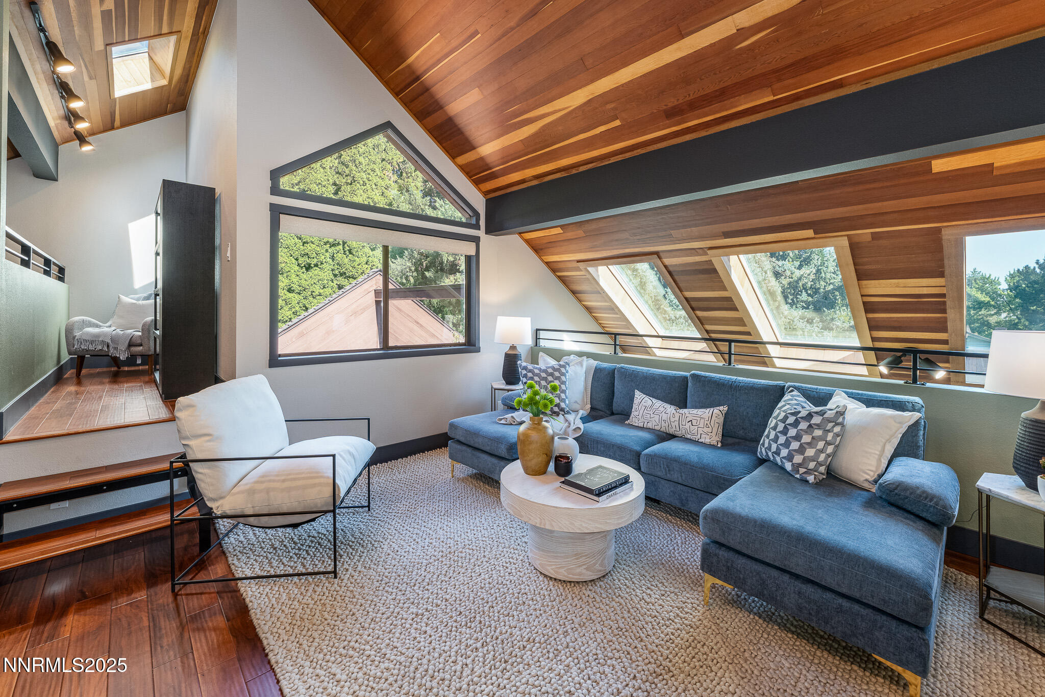 2521 Lake Ridge Shores Circle Reno, NV 89519 - Photo 32 of 54 a living room with furniture and a large window