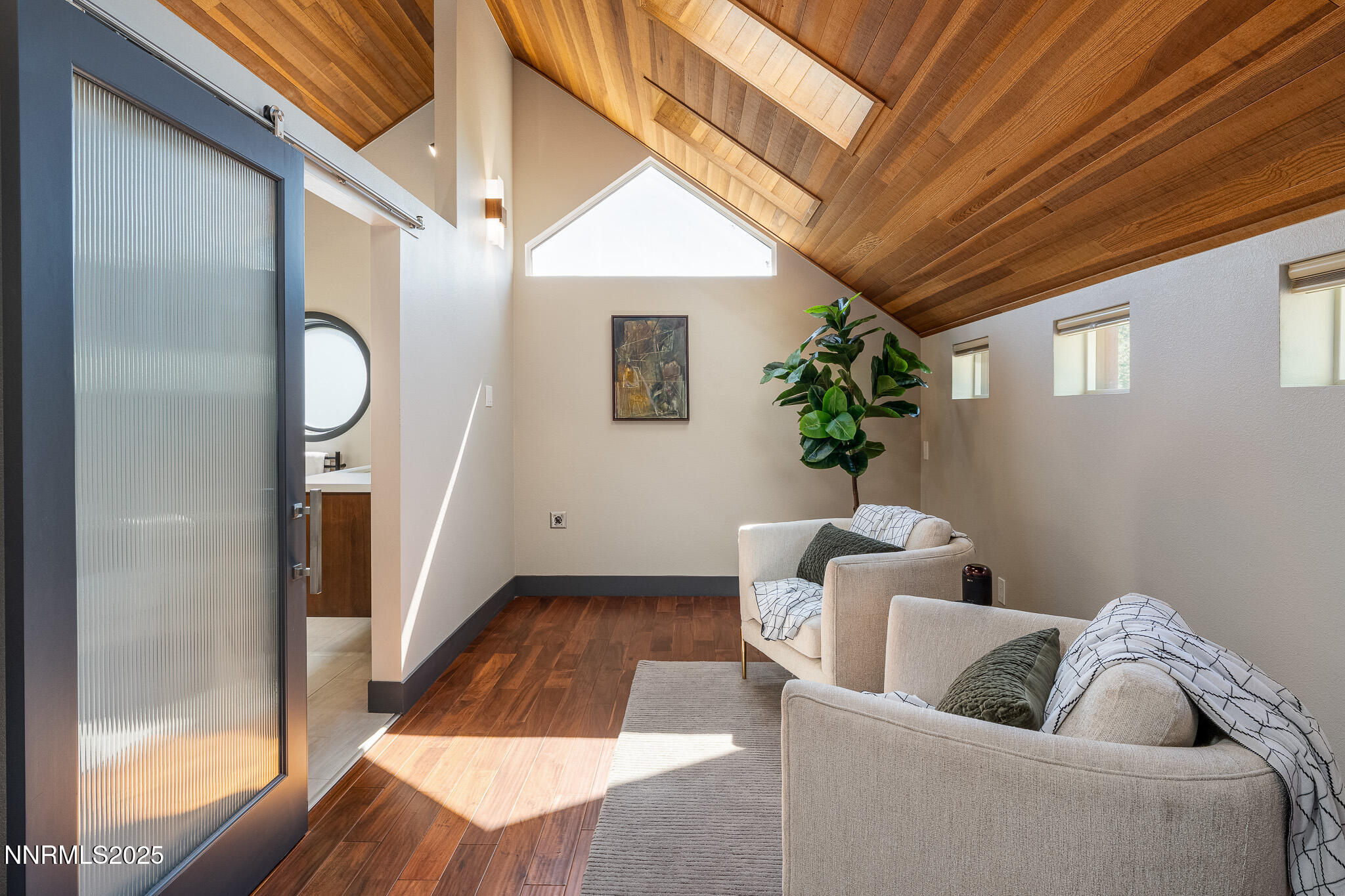 2521 Lake Ridge Shores Circle Reno, NV 89519 - Photo 35 of 54 a living room with furniture and wooden floor