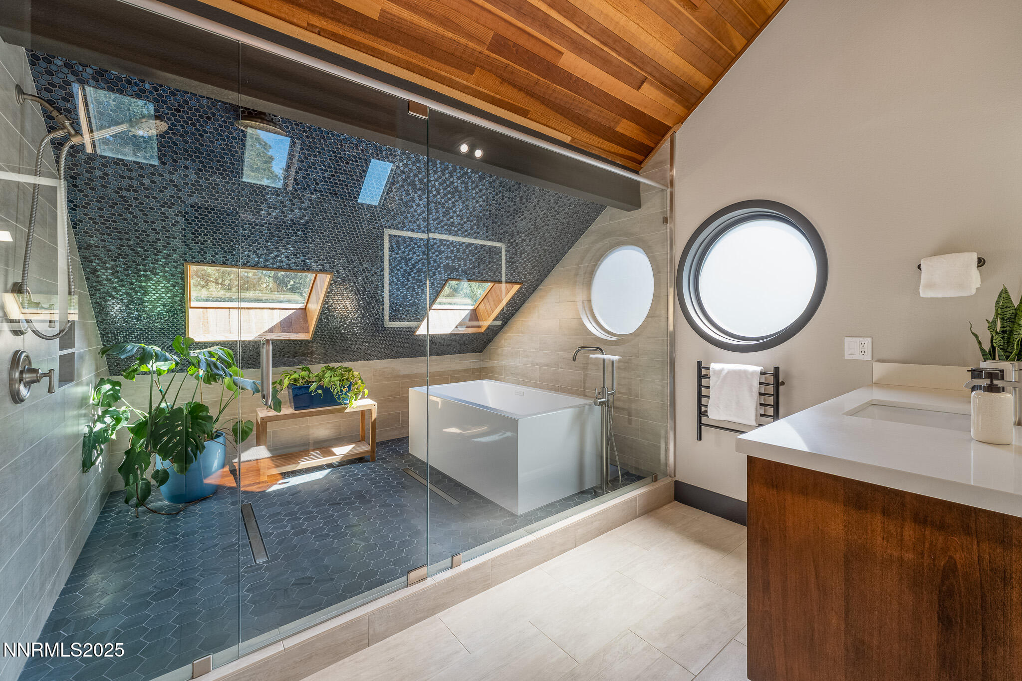 2521 Lake Ridge Shores Circle Reno, NV 89519 - Photo 36 of 54 a living room with furniture and a large window
