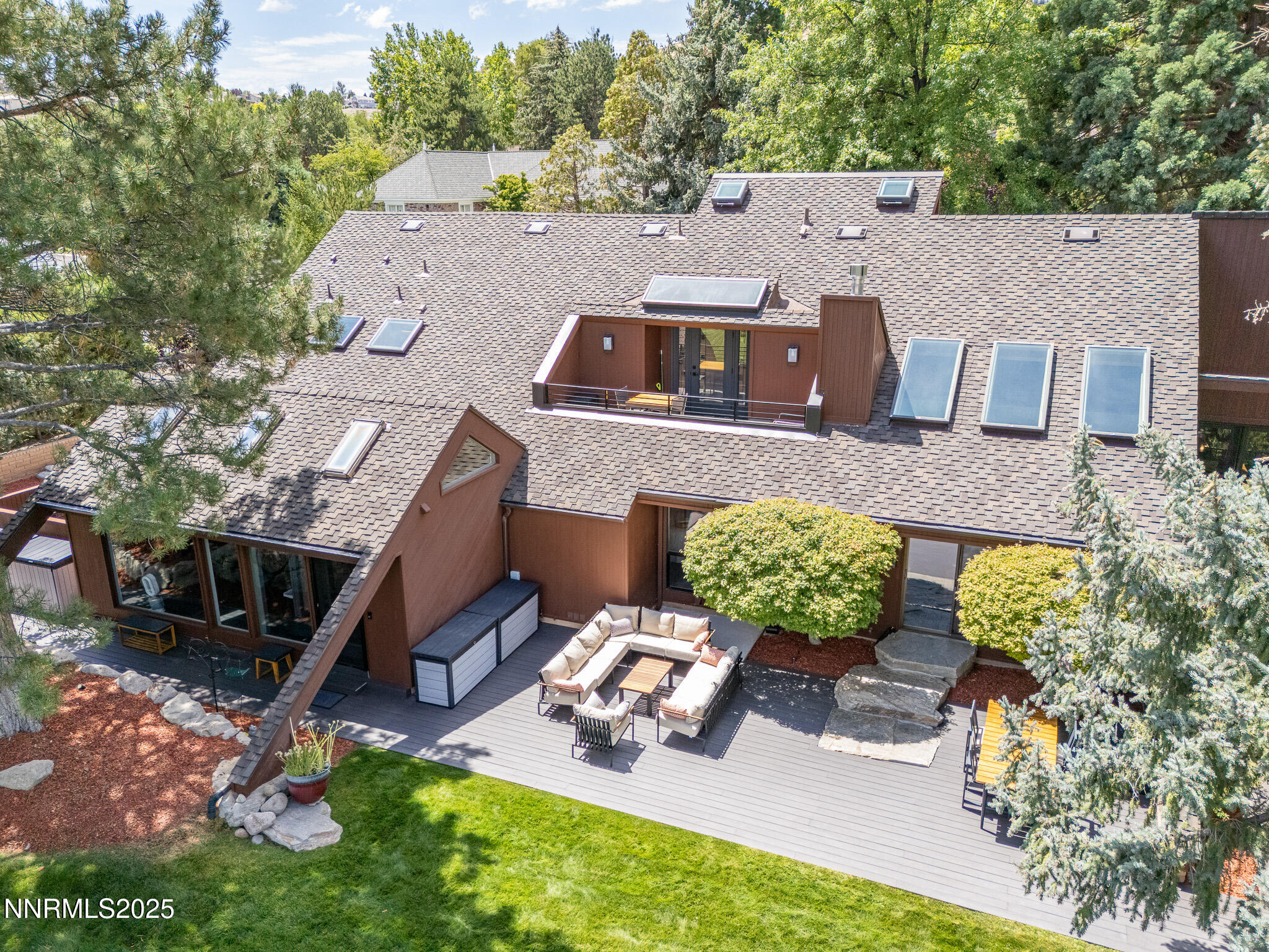 2521 Lake Ridge Shores Circle Reno, NV 89519 - Photo 39 of 54 an aerial view of a house with a garden and plants