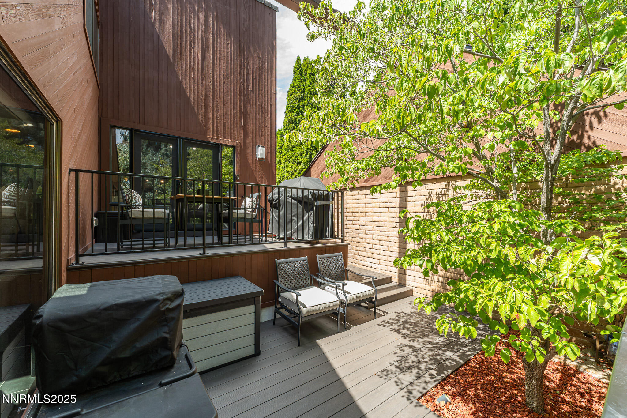 2521 Lake Ridge Shores Circle Reno, NV 89519 - Photo 43 of 54 a building outdoor space with patio couch and outdoor seating