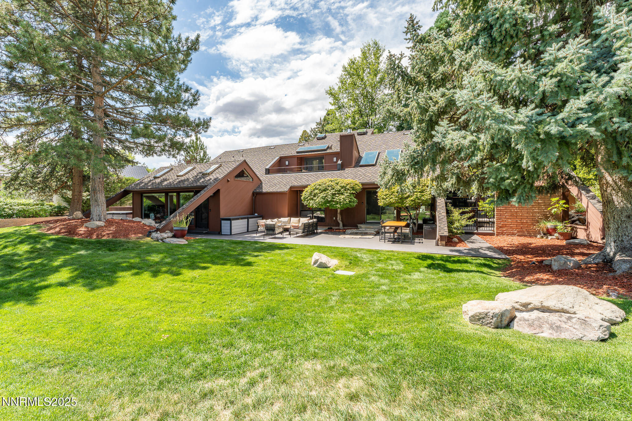 2521 Lake Ridge Shores Circle Reno, NV 89519 - Photo 47 of 54 a front view of a house with garden