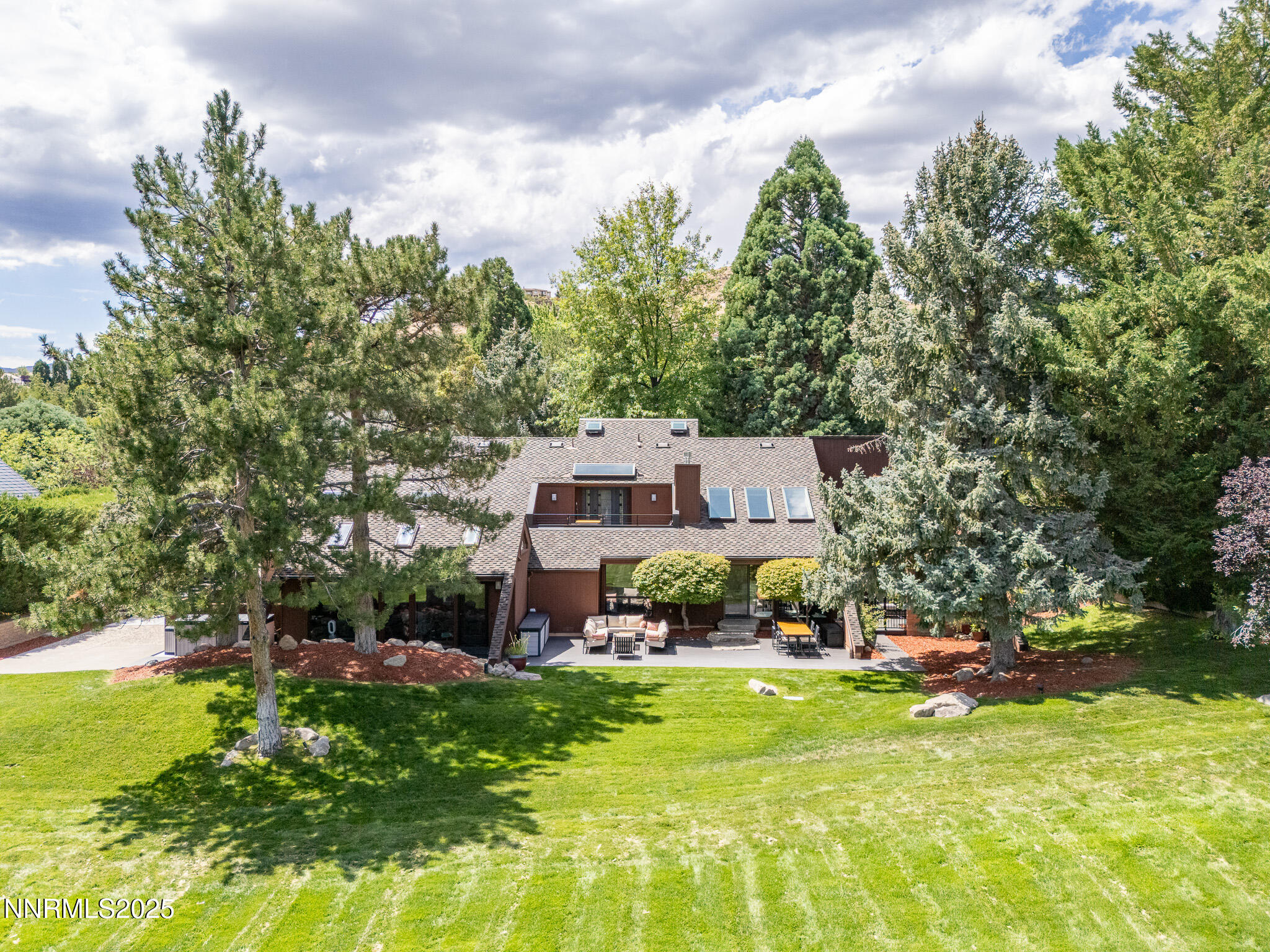 2521 Lake Ridge Shores Circle Reno, NV 89519 - Photo 48 of 54 a view of house with garden space and street view