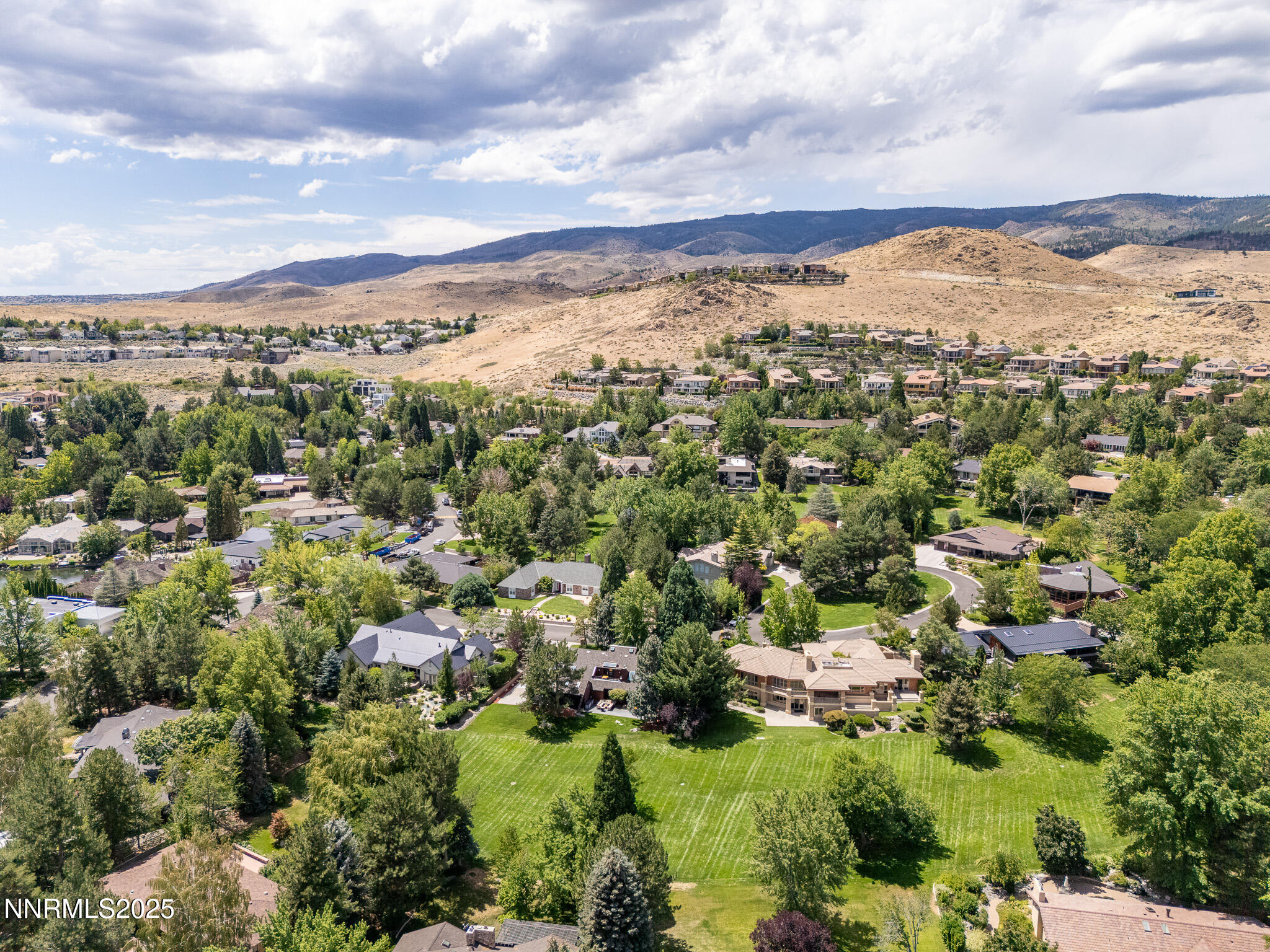 2521 Lake Ridge Shores Circle Reno, NV 89519 - Photo 54 of 54 an aerial view of houses covered in trees