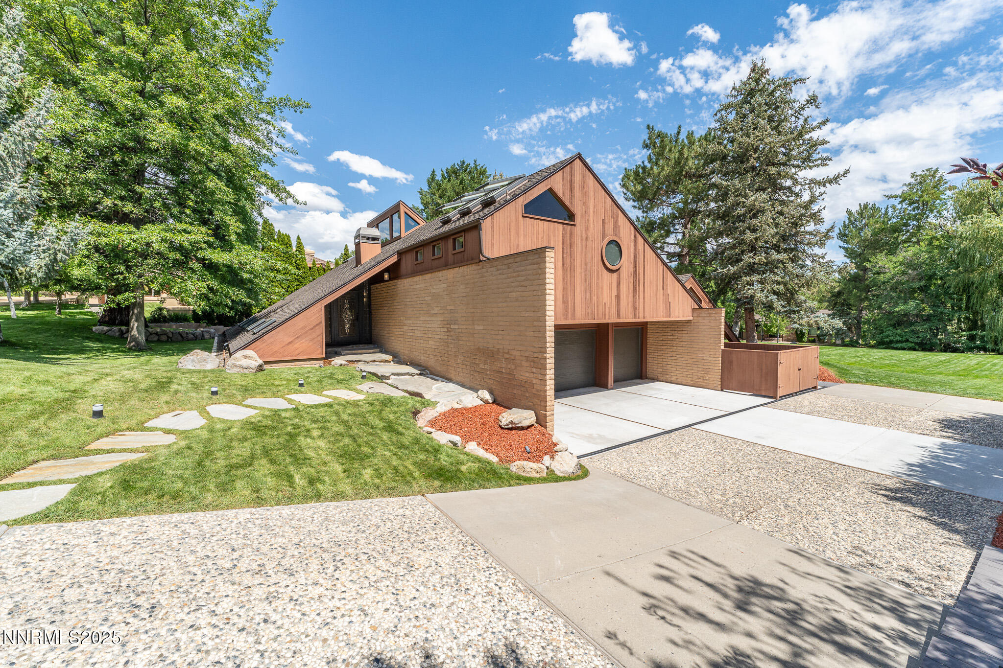 2521 Lake Ridge Shores Circle Reno, NV 89519 - Photo 6 of 54 a view of a house with a backyard