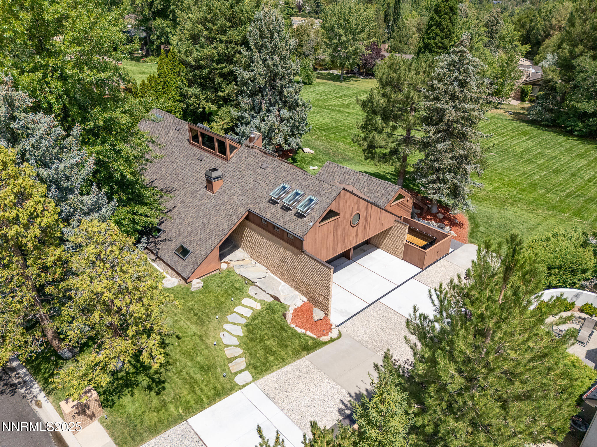 2521 Lake Ridge Shores Circle Reno, NV 89519 - Photo 9 of 54 an aerial view of a house with a yard