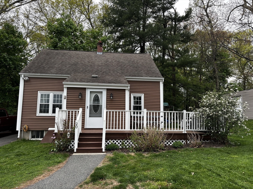 20 Cooks Lane Bellingham, MA 02019 - Photo 1 of 21 a front view of a house with a garden
