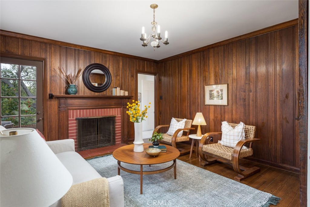 2435 Ridgeway Road San Marino, CA 91108 - Photo 12 of 38 a living room with furniture and a fireplace