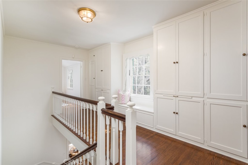 2435 Ridgeway Road San Marino, CA 91108 - Photo 17 of 38 a view of a hallway with entryway and wooden floor