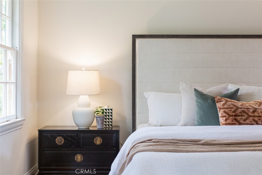 2435 Ridgeway Road San Marino, CA 91108 - Photo 22 of 38 a bedroom with a bed and window