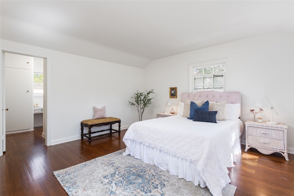 2435 Ridgeway Road San Marino, CA 91108 - Photo 25 of 38 a bedroom with a bed and wooden floor
