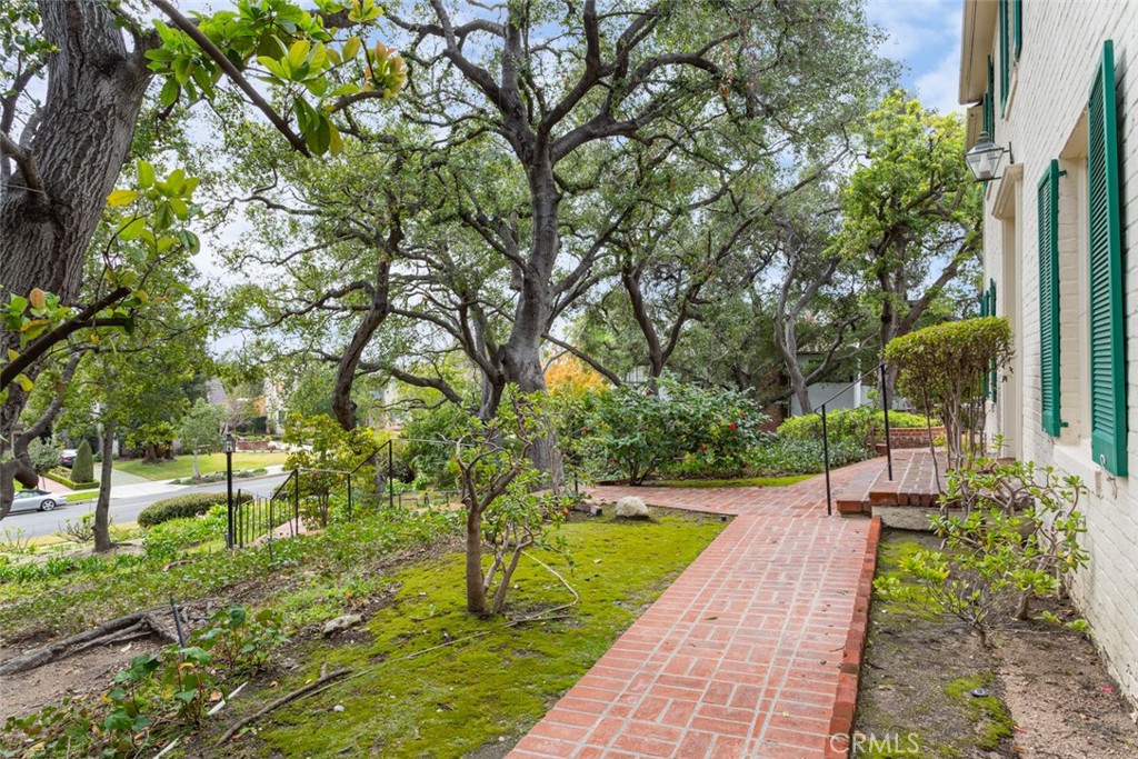2435 Ridgeway Road San Marino, CA 91108 - Photo 35 of 38 a view of swimming pool with a yard