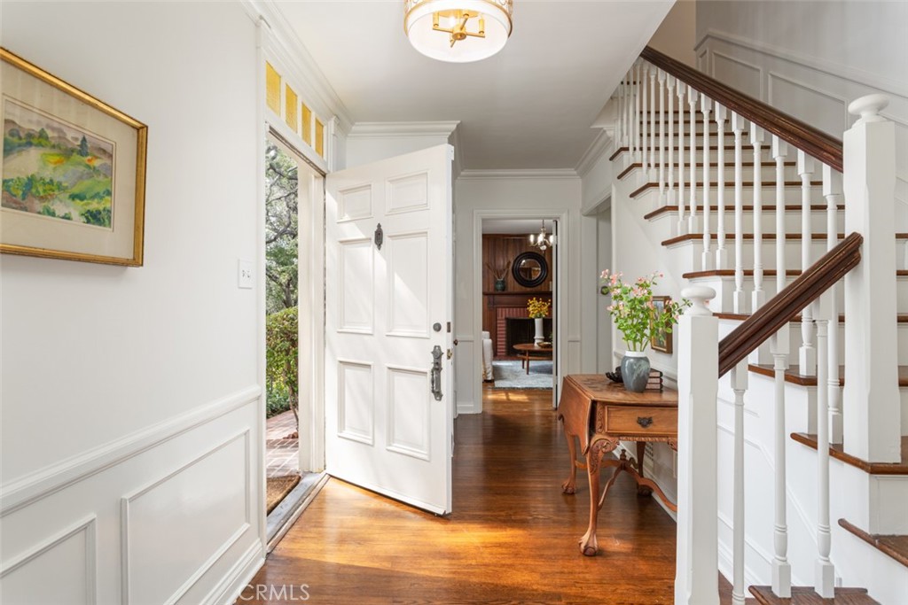 2435 Ridgeway Road San Marino, CA 91108 - Photo 4 of 38 a view of entryway with workspace and wooden floor