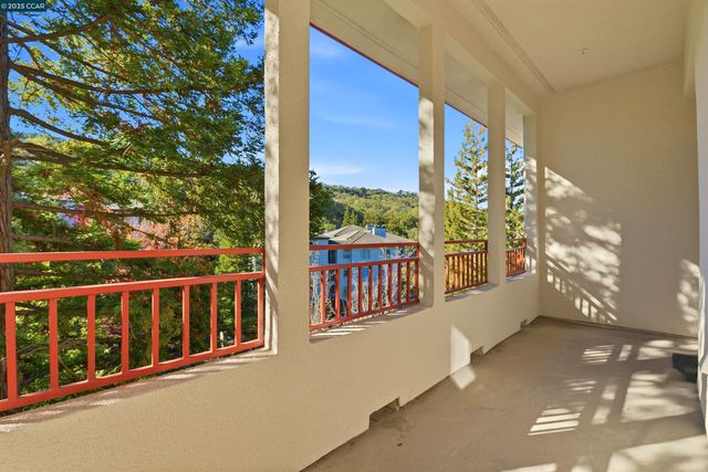 a front view of a house with a garage