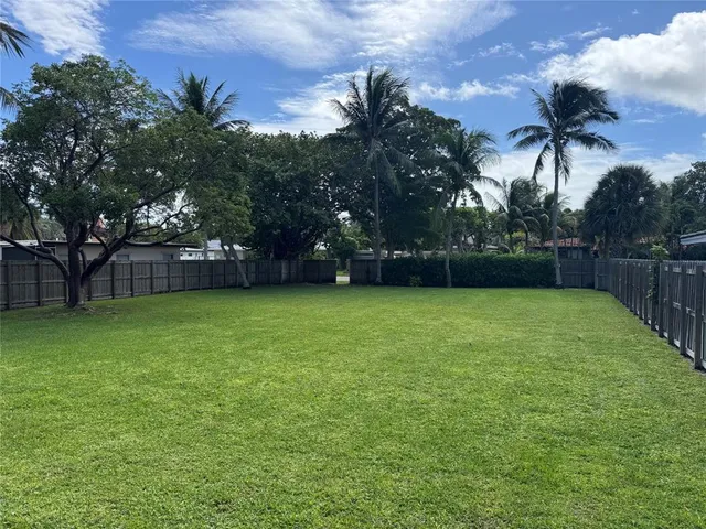 a view of a backyard with a garden