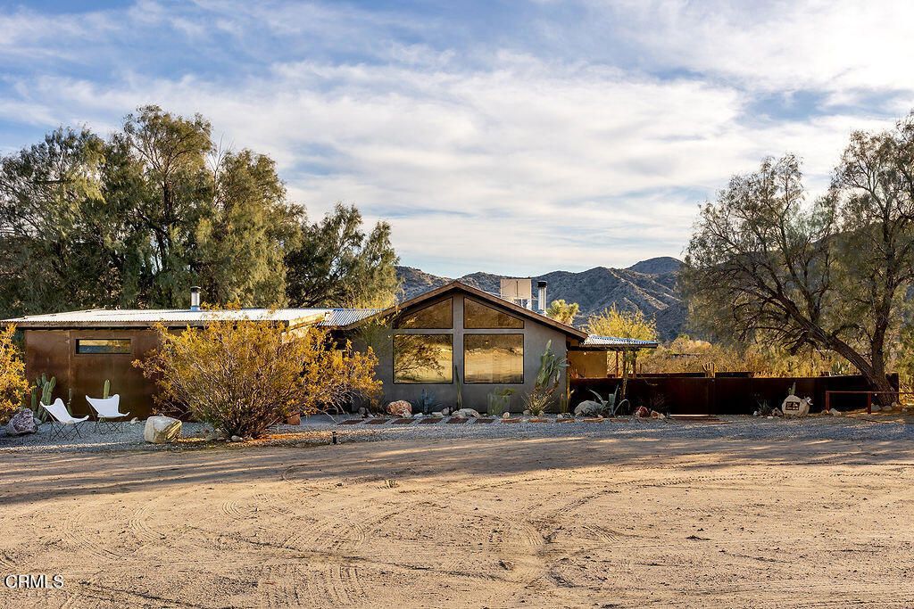 9427 T-Circle Drive Morongo Valley, CA 92256 - Photo 1 of 41 a view of a house with a yard