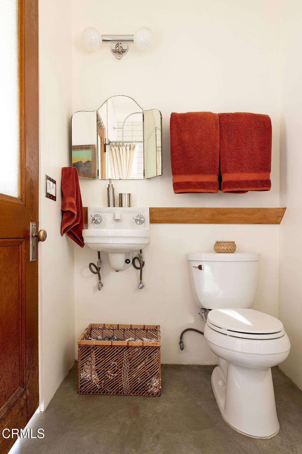 9427 T-Circle Drive Morongo Valley, CA 92256 - Photo 23 of 41 a bathroom with a toilet sink and mirror
