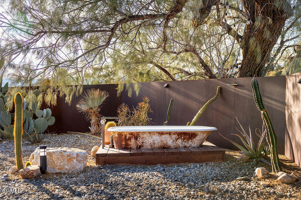 9427 T-Circle Drive Morongo Valley, CA 92256 - Photo 28 of 41 a view of a yard with large trees