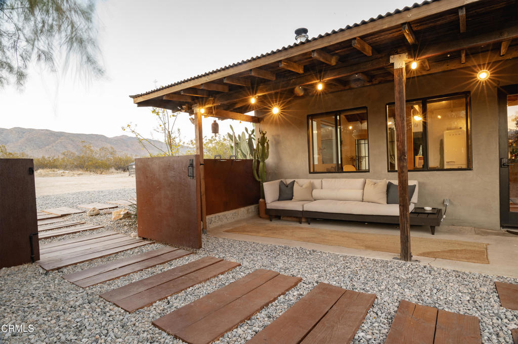 9427 T-Circle Drive Morongo Valley, CA 92256 - Photo 38 of 41 a building outdoor space with patio furniture
