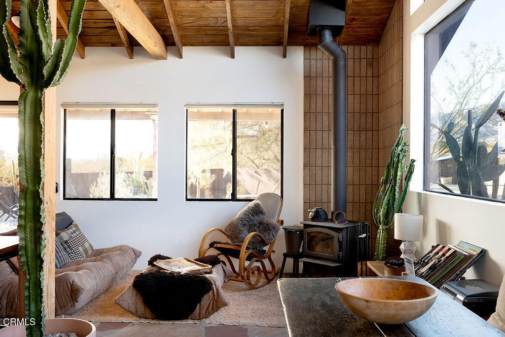 9427 T-Circle Drive Morongo Valley, CA 92256 - Photo 6 of 41 a bed room with a bed and a couch