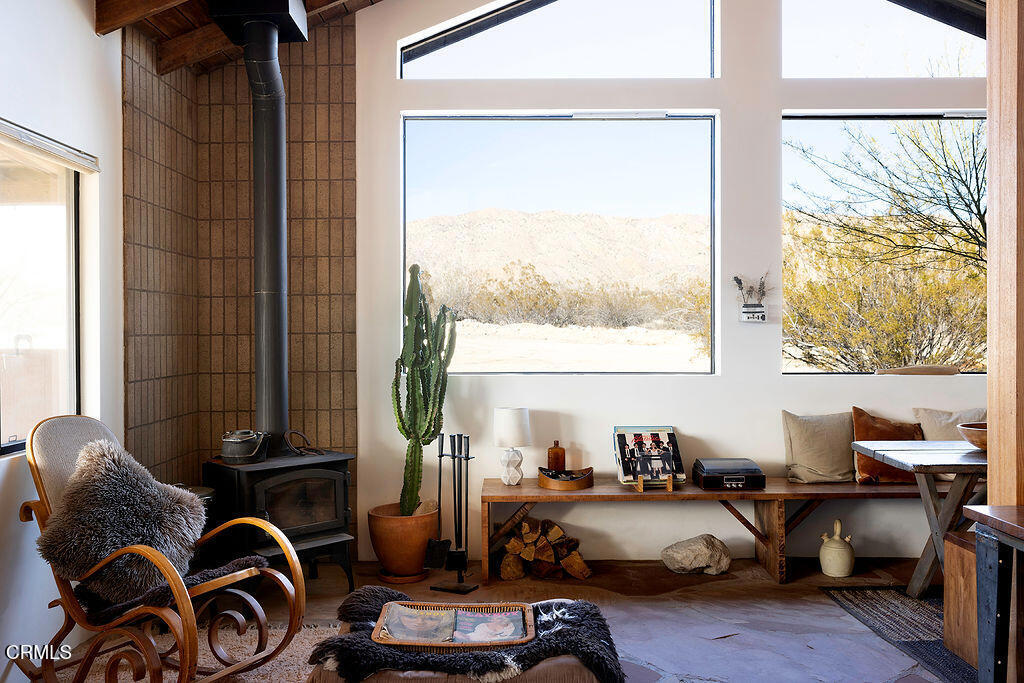 9427 T-Circle Drive Morongo Valley, CA 92256 - Photo 7 of 41 a living room with furniture and two window