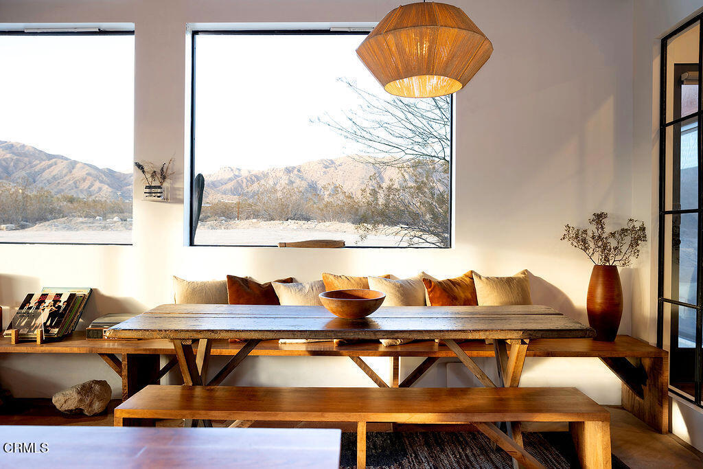 9427 T-Circle Drive Morongo Valley, CA 92256 - Photo 10 of 41 a outdoor dining space with furniture and outdoor seating