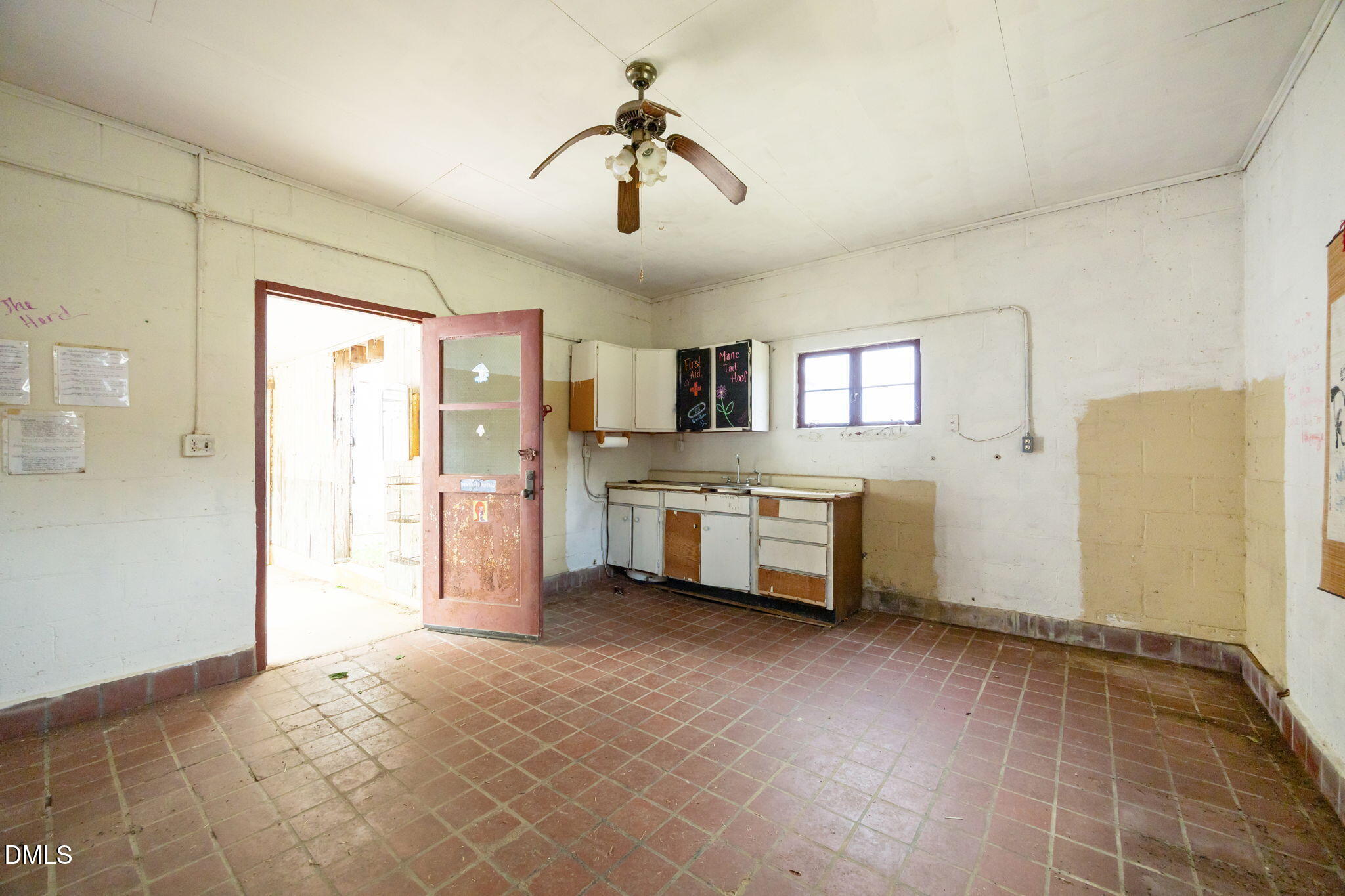 423 Quail Roost Farm Road Rougemont, NC 27572 - Photo 43 of 44 a view of a kitchen with a sink and cabinet area