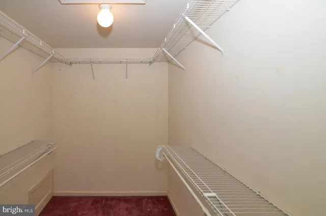 a view of a room with racks on the wall