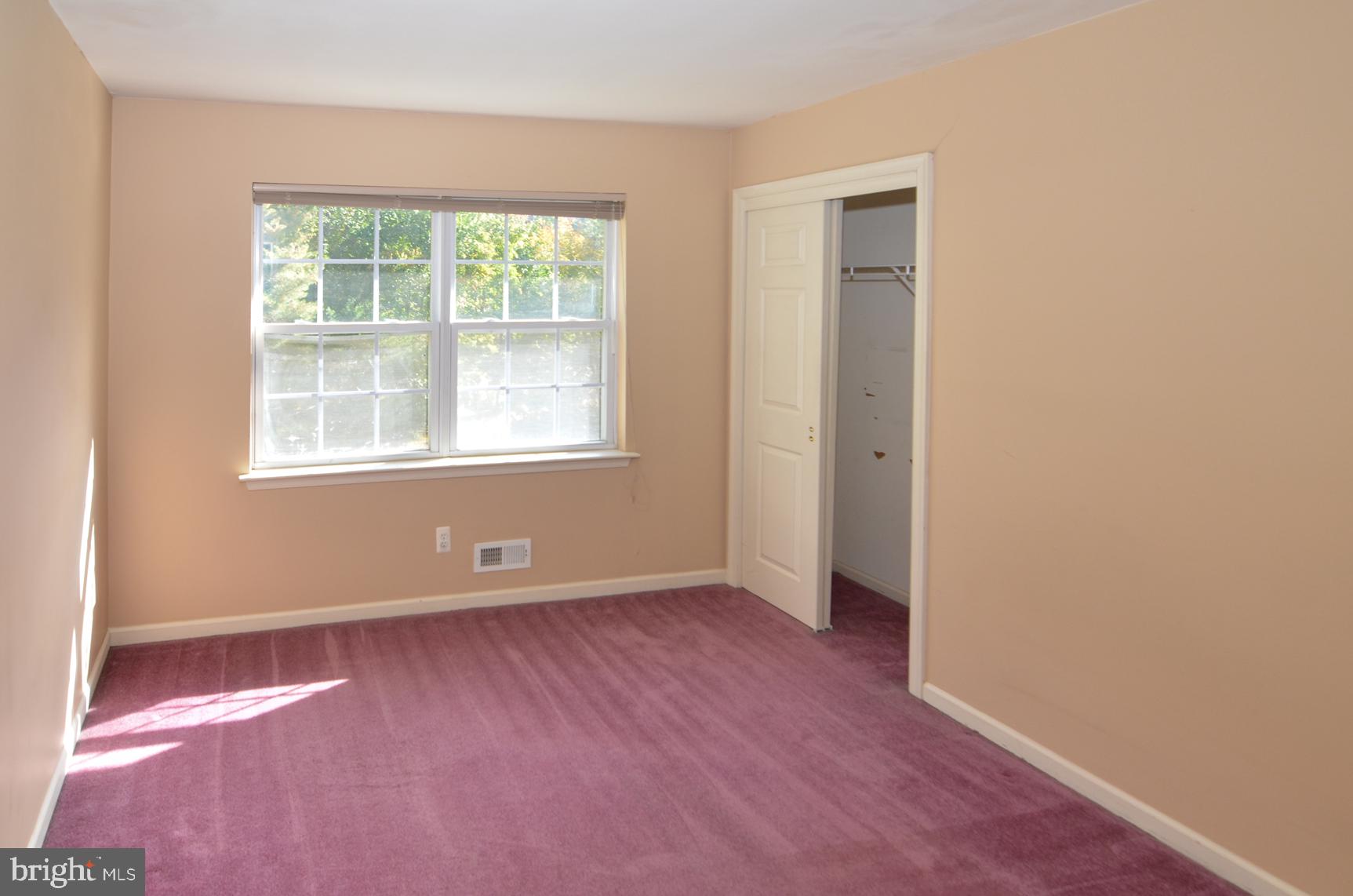 9 Noa Court Hamilton, NJ 08690 - Photo 28 of 47 an empty room with wooden floor and windows