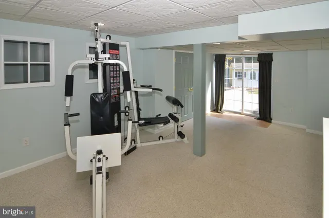 a view of a room with gym equipment