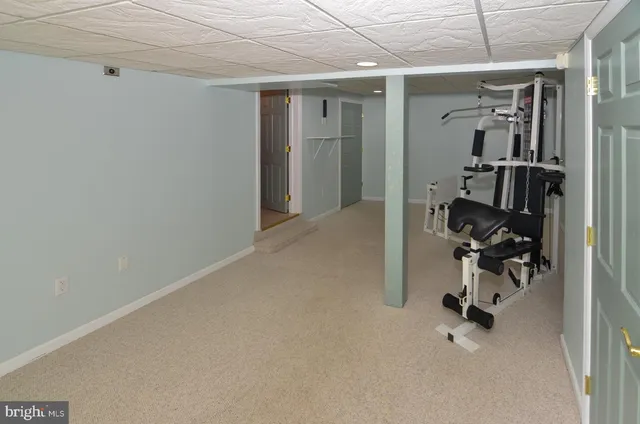 a bathroom with a toilet and shower