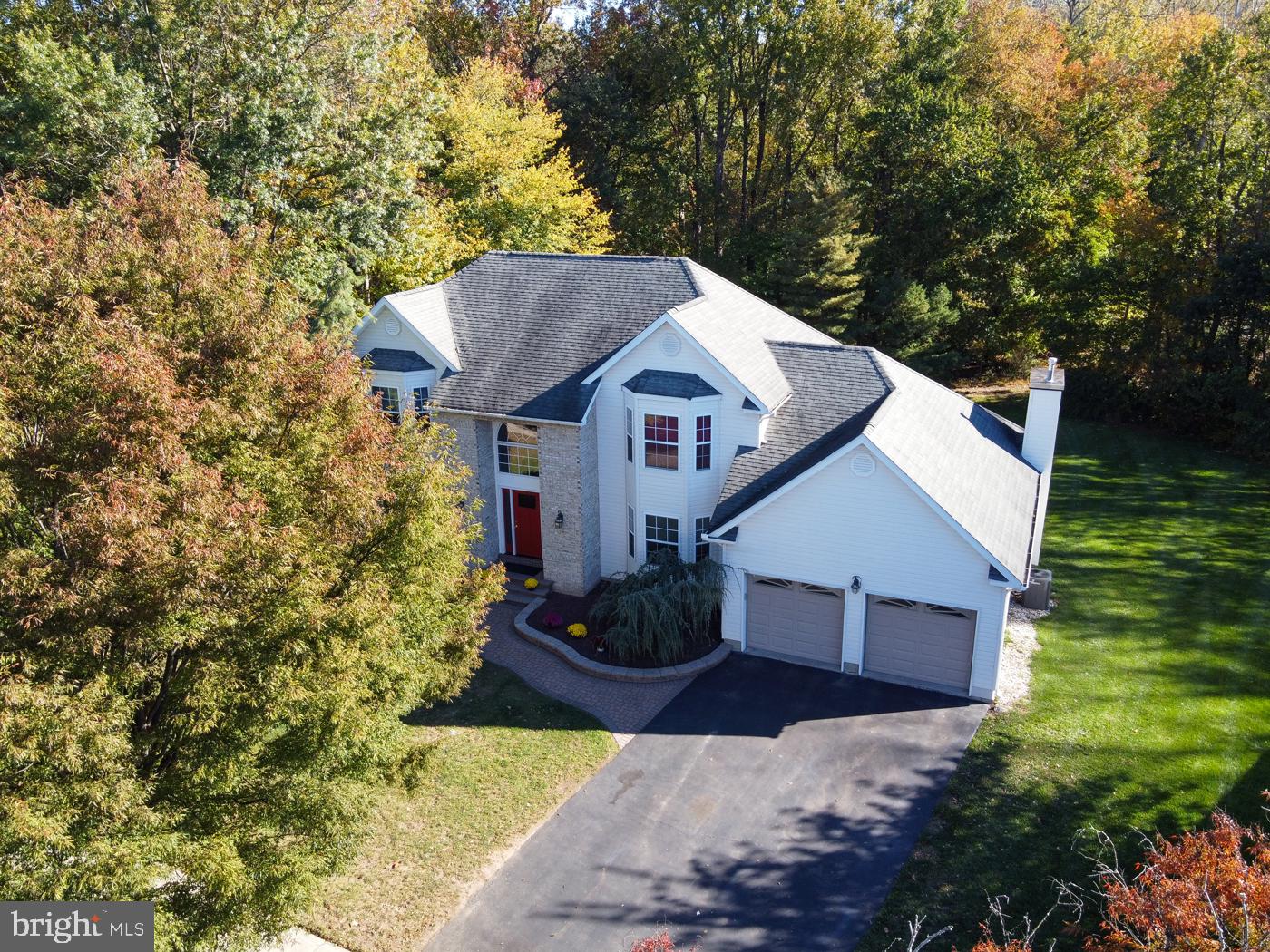 9 Noa Court Hamilton, NJ 08690 - Photo 4 of 47 a view of a house with a yard