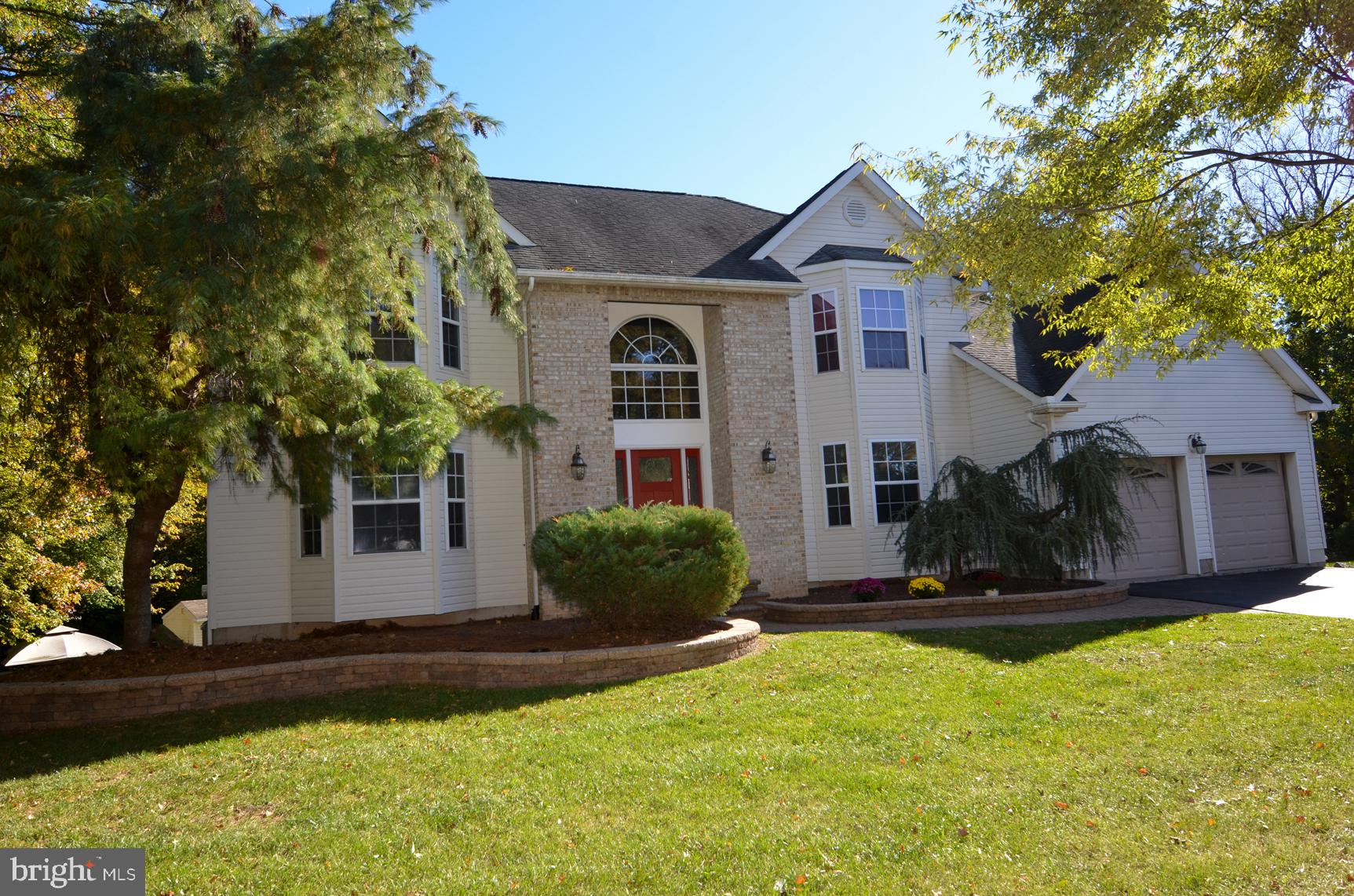 9 Noa Court Hamilton, NJ 08690 - Photo 46 of 47 a front view of a house with a yard