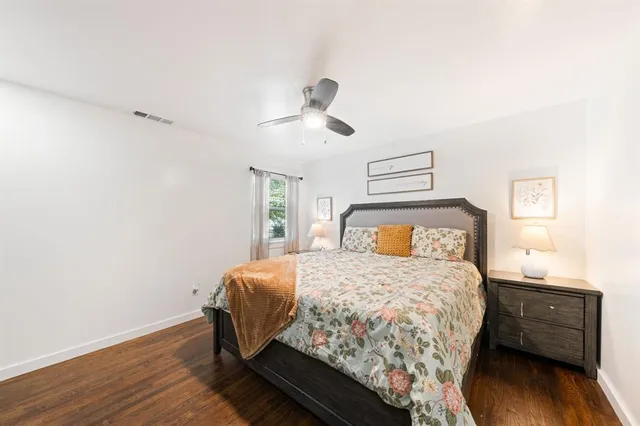 a kitchen with stainless steel appliances a refrigerator sink and microwave