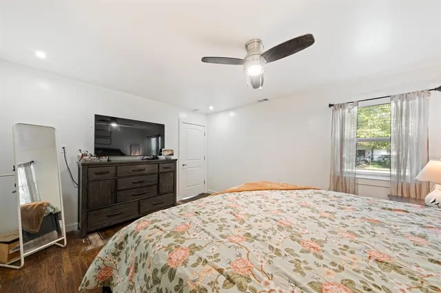 a kitchen with a sink a stove and cabinets