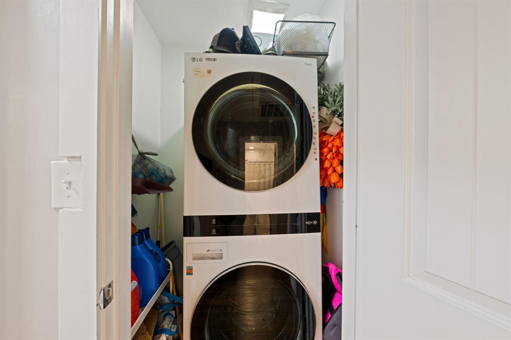 2114 Engle Avenue Dallas, TX 75224 - Photo 19 of 27 a utility room with dryer and washer