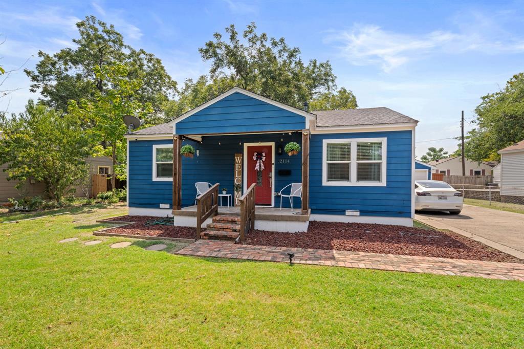 2114 Engle Avenue Dallas, TX 75224 - Photo 25 of 27 a view of a house with backyard porch and sitting area