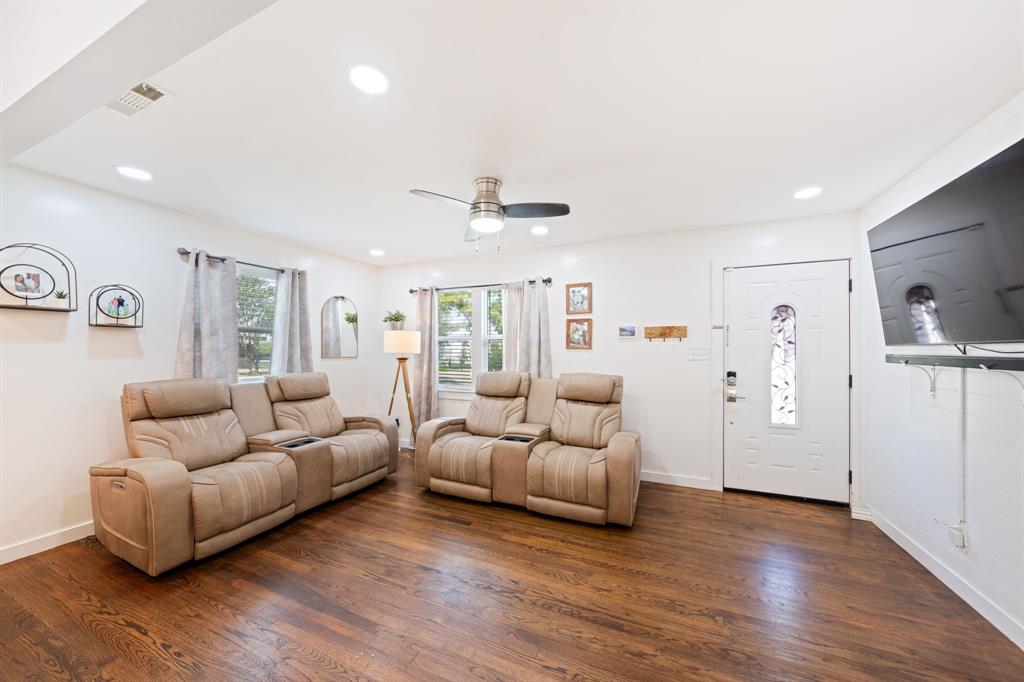 2114 Engle Avenue Dallas, TX 75224 - Photo 4 of 27 a living room with furniture and a flat screen tv