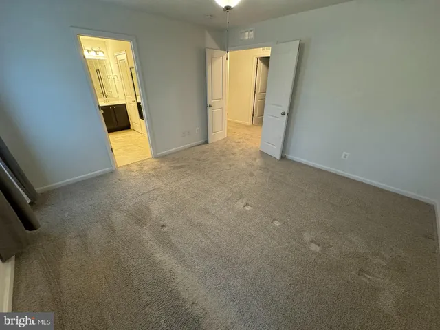 a view of a room with a staircase