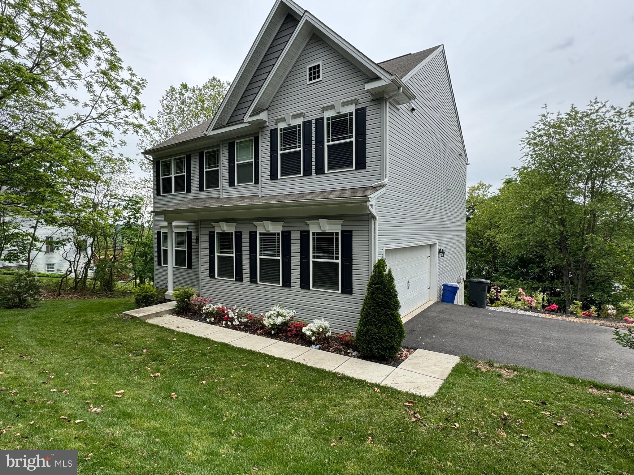 1003 Chestnut Street Delta, PA 17314 - Photo 2 of 27 a front view of a house with a yard