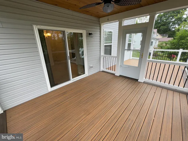 a view of outdoor space with deck and balcony
