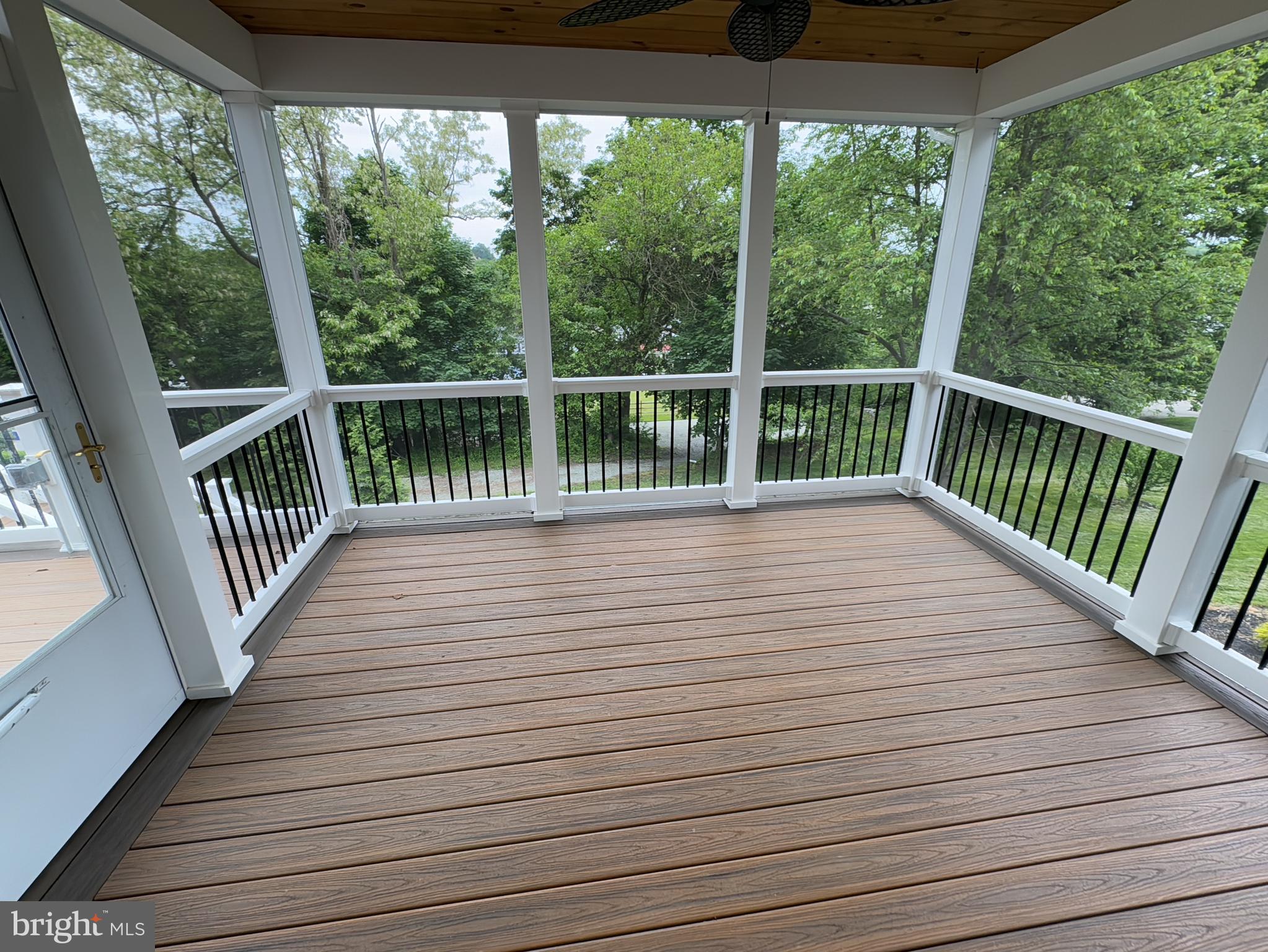 1003 Chestnut Street Delta, PA 17314 - Photo 5 of 27 a view of a balcony with wooden floor